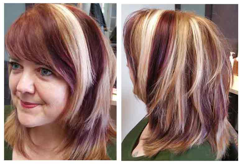 woman with medium hair chunky red blond highlights